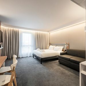 Suite met een Queen Size Bed